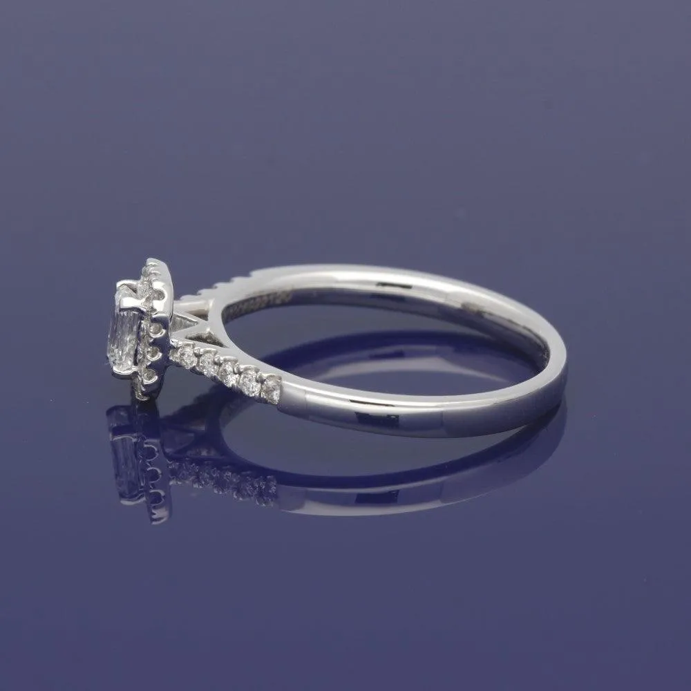 18ct White Gold Certificated Emerald Cut Diamond Halo Ring
