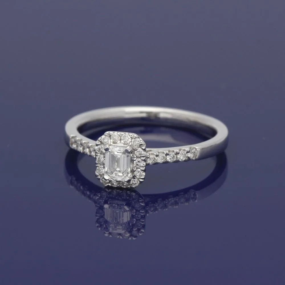 18ct White Gold Certificated Emerald Cut Diamond Halo Ring