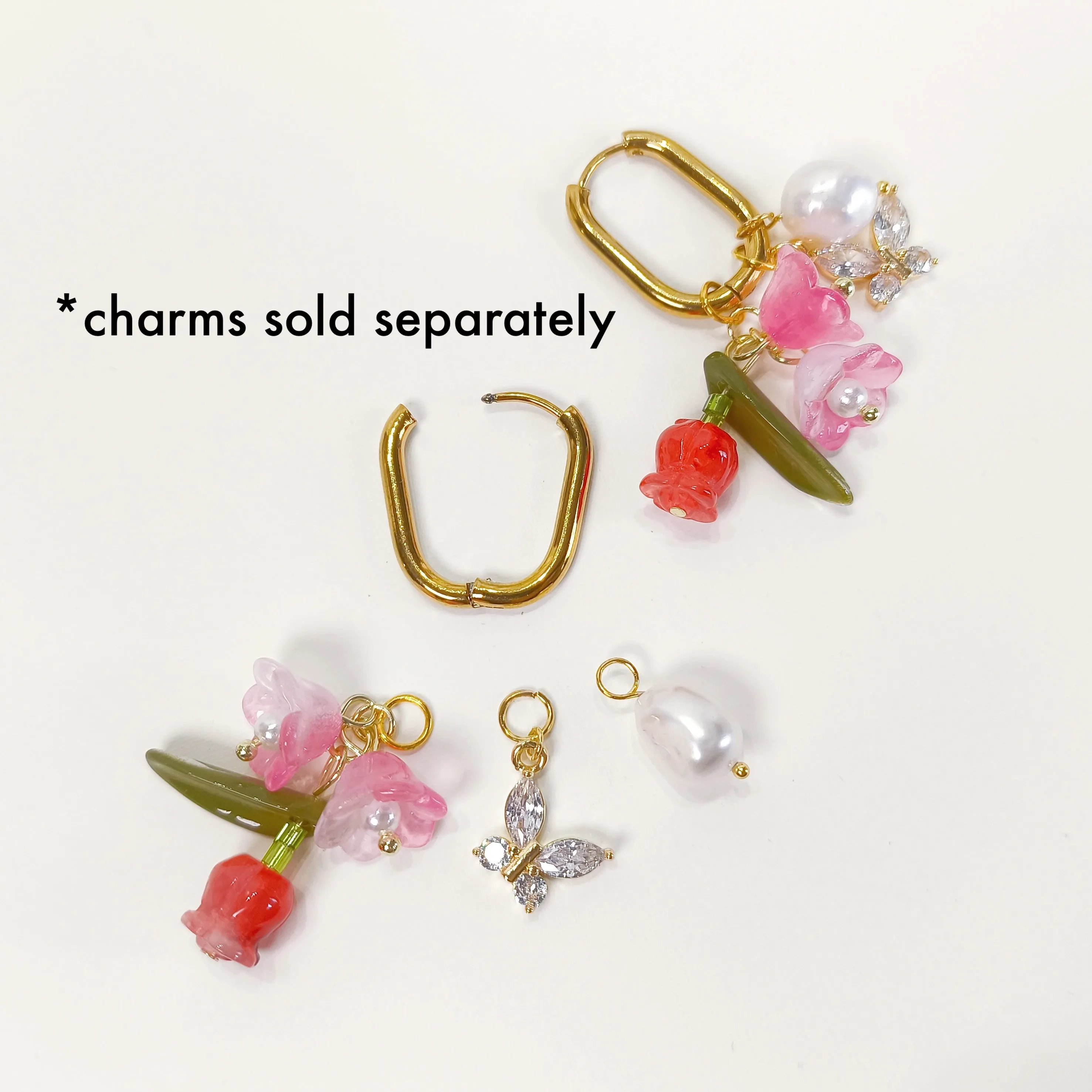 E080 gold oval rectangular hoops