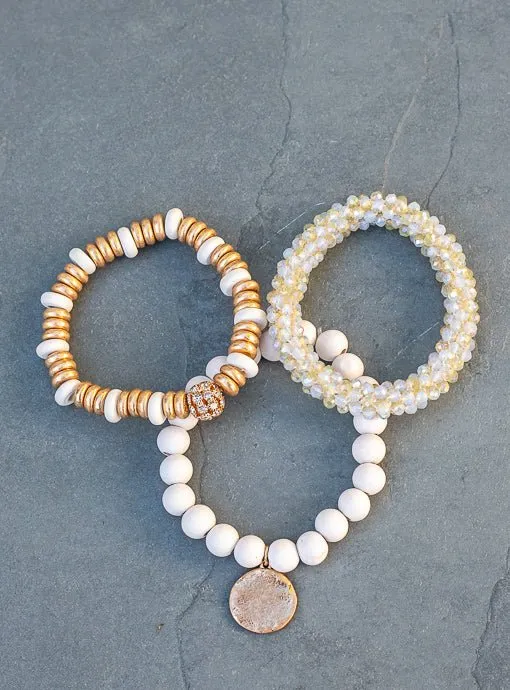 Ivory Gold Three Piece Bracelet Set With Charm