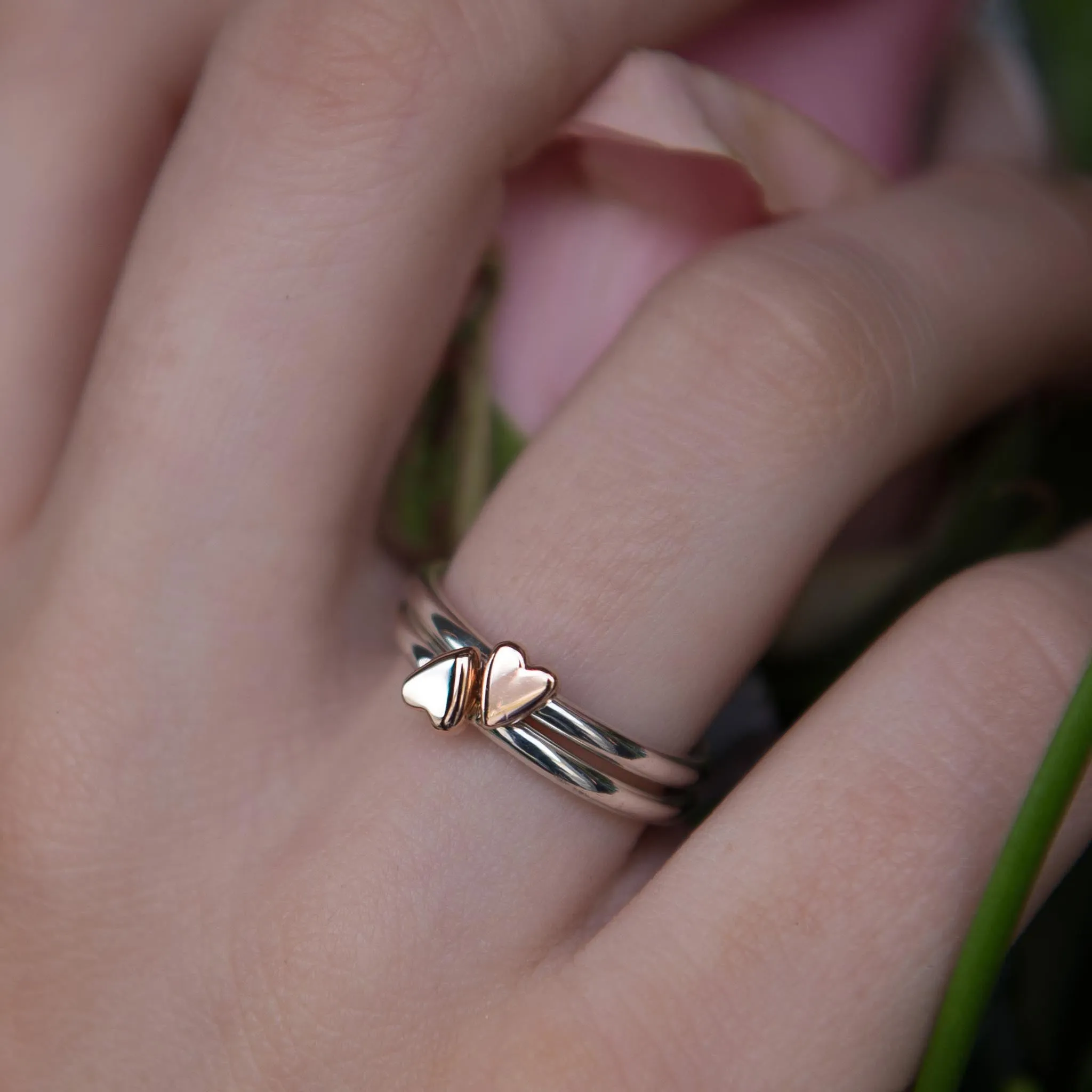 Two Lunar Silver And Gold Heart Rings